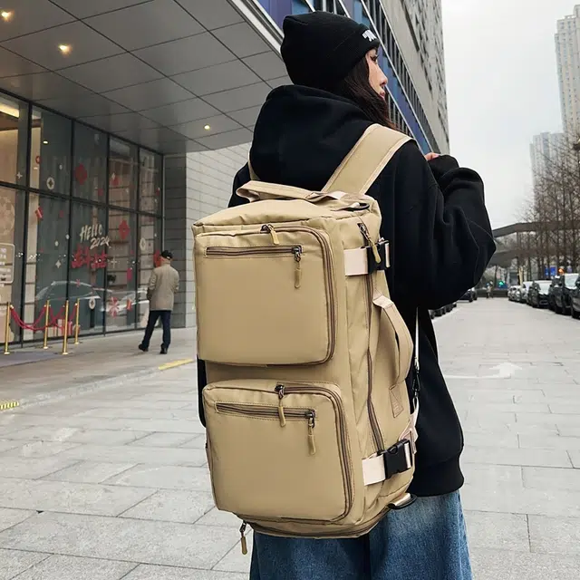 德力熊背包男女通用双色单肩包青年商务多用双肩单肩斜挎手提包休闲大容量短途旅行包牛皮多色尼龙