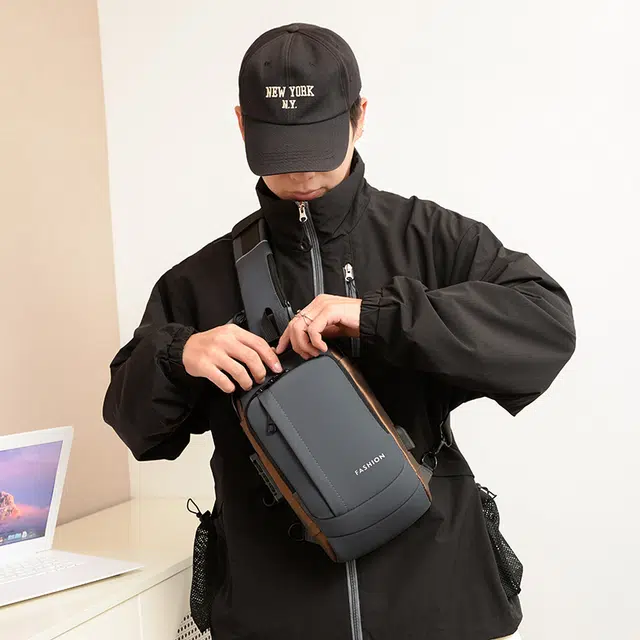 德力熊 新款防盗密码锁机车包潮酷骑行 牛津纺 腰包胸包 男款 蓝/黑/灰/黑金