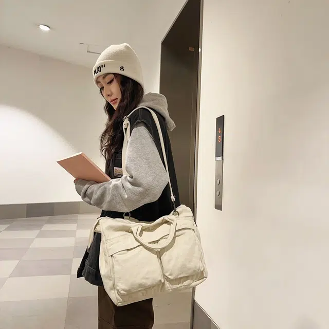 德力熊 大容量日系复古通勤拉链开合 帆布 单肩包 常规 男女同款情侣款 黑/白/绿/棕