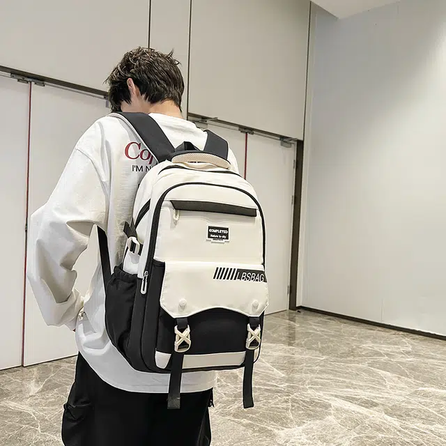 德力熊 时尚潮流初中生高中生休闲书包大容量轻便 尼龙 双肩包 男女同款情侣款 黑色/灰色/卡其色/紫色/绿色