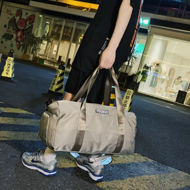 德力熊 多功能休闲简约 尼龙 单肩包 常规 男女同款情侣款 黑色卡其色粉色