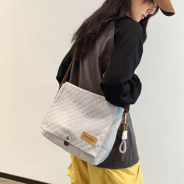 德力熊 尼龙 男女同款情侣款 潮牌新款韩系工装风背包学生休闲单肩包 多色