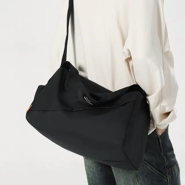 德力熊 纯色时尚潮流百搭高级 牛津布 斜挎单肩包 常规 男女同款情侣款 多色