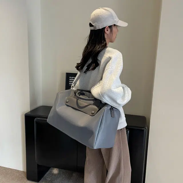 德力熊单肩包尼龙布大号三色可选轻便旅行单肩手提可斜挎背包情侣男女通用