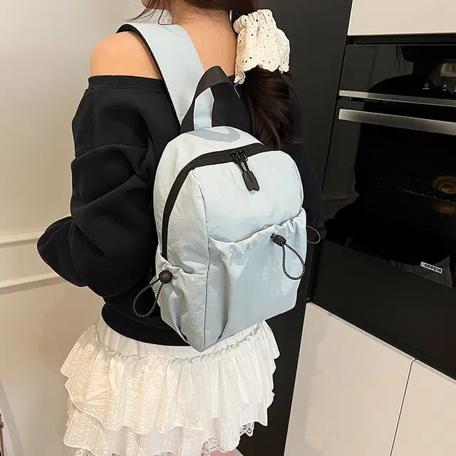 德力熊 轻便简约背包小众设计斜挎包 尼龙 胸包 常规 男女同款情侣款 多色