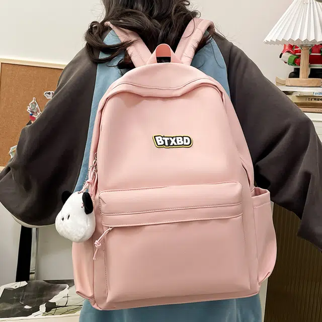 德力熊  尼龙男女通用多色高颜值学生书包纯色大容量双肩包尼龙简约百搭小众背包