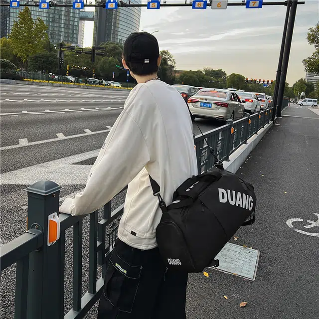 德力熊 大容量潮酷韩版潮流时尚运动休闲短途旅行 牛津布 可斜挎书包背包双肩包 常规 男女同款情侣款 黑色/灰色/卡其色