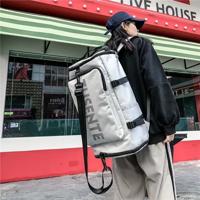 德力熊 轻便大容量多功能休闲单肩斜挎两背 牛津布 书包背包双肩包 大号 男女同款情侣款 黑/红/灰