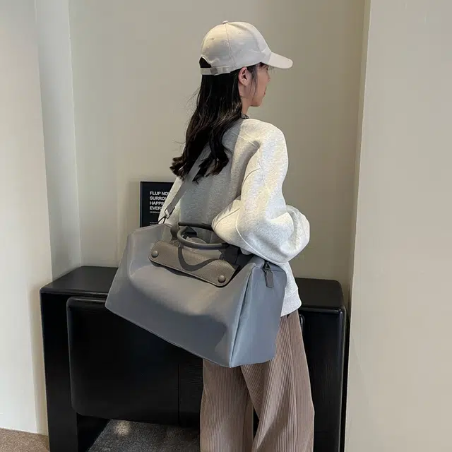 德力熊单肩包尼龙布大号三色可选轻便旅行单肩手提可斜挎背包情侣男女通用