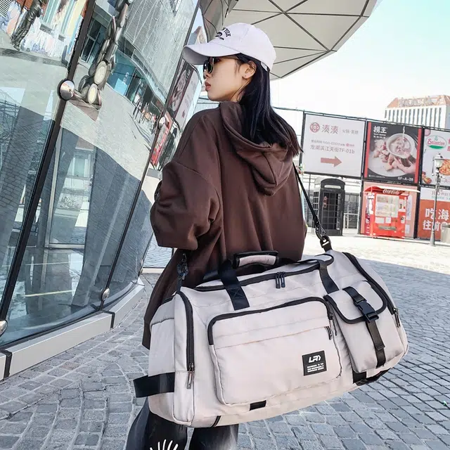 德力熊 大容量轻便多功能 尼龙 斜挎旅行包 常规 男女同款情侣款 灰色/黑色/绿色