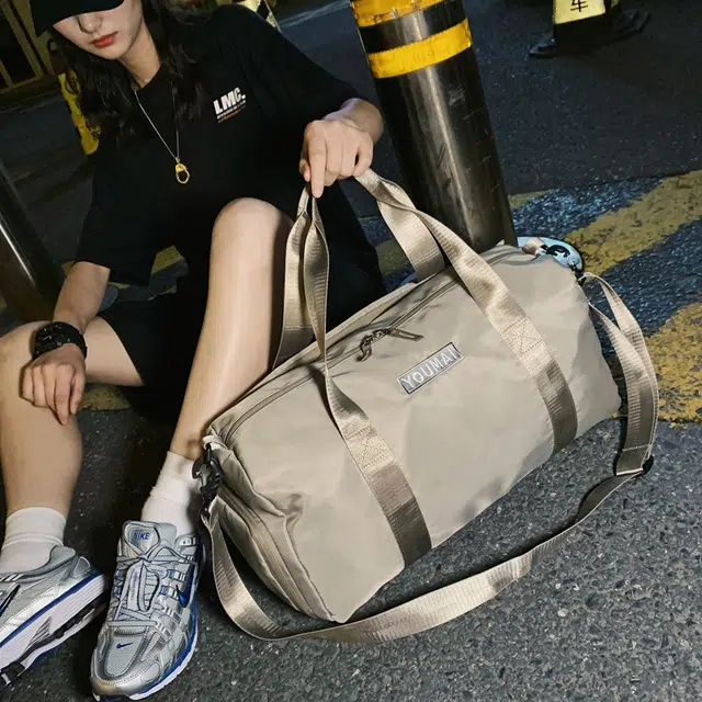 德力熊 多功能休闲简约 尼龙 单肩包 常规 男女同款情侣款 黑色卡其色粉色