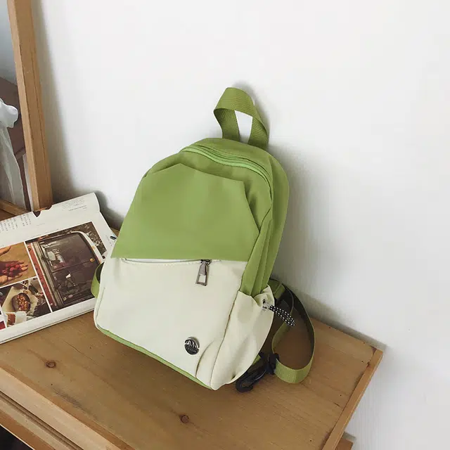 德力熊 时尚百搭撞色双肩包休闲轻便 尼龙 胸包 常规 男女同款情侣款 多色