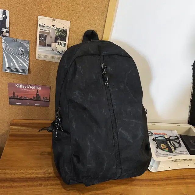 德力熊 时尚印花大容量休闲背包初中高中大学生轻便书包潮流旅行包 尼龙 双肩包 常规 男女同款情侣款 黑色/白色/绿色/灰色/红色