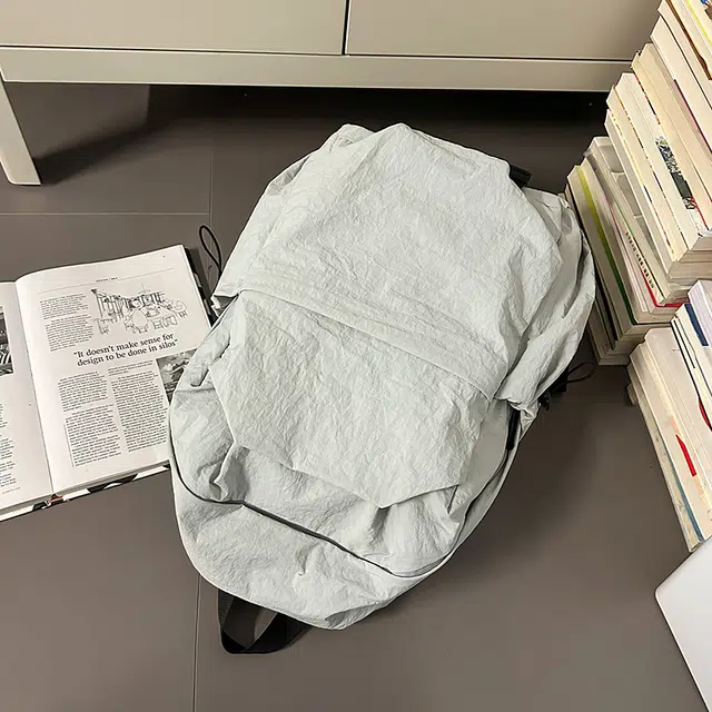 德力熊 纯色简约大容量轻便百搭 尼龙 双肩包 常规 男女同款情侣款 黑色/灰色/棕色/绿色