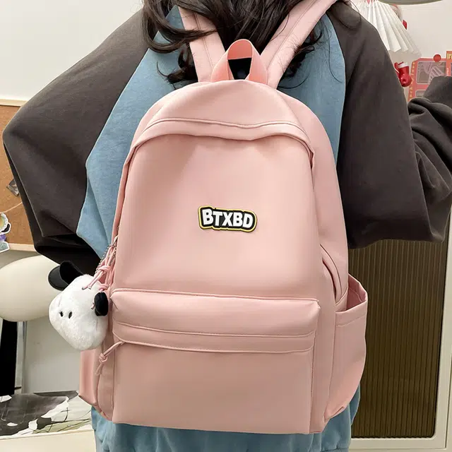 德力熊  尼龙男女通用多色高颜值学生书包纯色大容量双肩包尼龙简约百搭小众背包