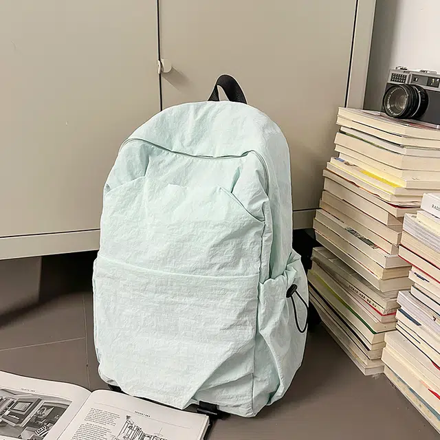 德力熊 纯色简约大容量轻便百搭 尼龙 双肩包 常规 男女同款情侣款 黑色/灰色/棕色/绿色
