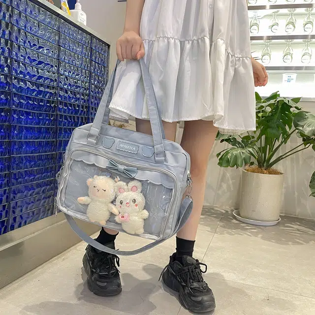 德力熊 日系软妹蝴蝶结 尼龙 斜挎单肩包 常规 女款 粉/蓝/白/黑