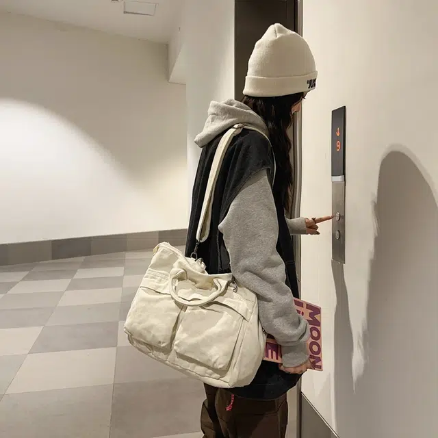 德力熊 大容量日系复古通勤拉链开合 帆布 单肩包 常规 男女同款情侣款 黑/白/绿/棕