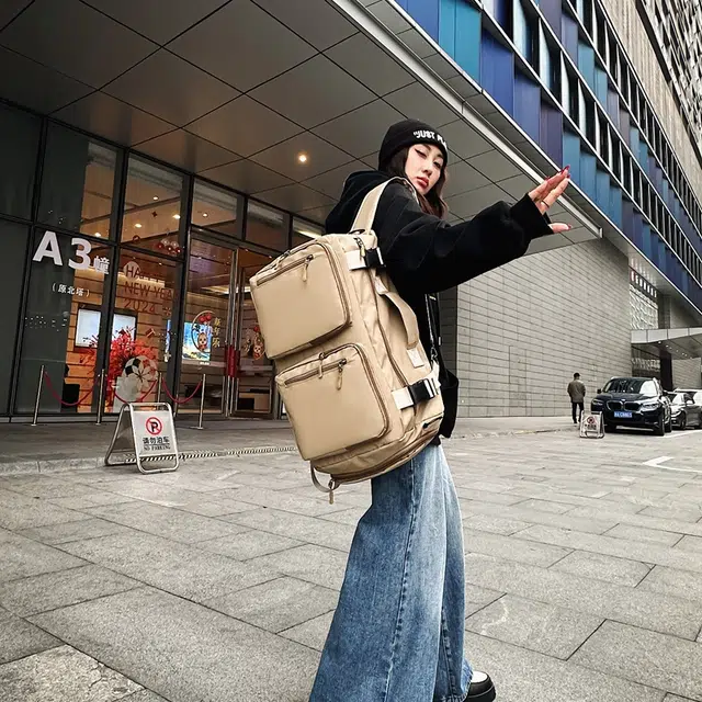 德力熊背包男女通用双色单肩包青年商务多用双肩单肩斜挎手提包休闲大容量短途旅行包牛皮多色尼龙