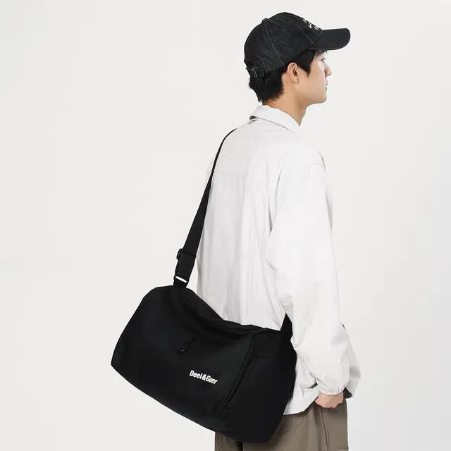 德力熊 大容量单肩篮球包手提百搭简约时尚运动健身包轻便出差行李包 牛津布 斜挎包 常规 男女同款情侣款 多色