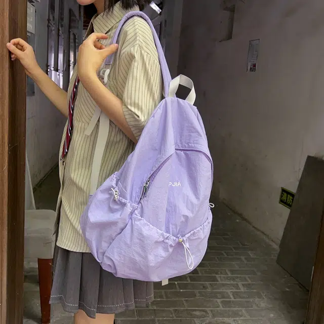 德力熊  尼龙男女通用多色超轻简约纯色双肩包尼龙大容量学生书包外出旅行背包