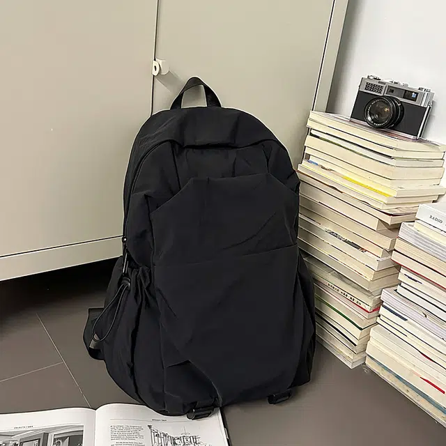 德力熊 纯色简约大容量轻便百搭 尼龙 双肩包 常规 男女同款情侣款 黑色/灰色/棕色/绿色