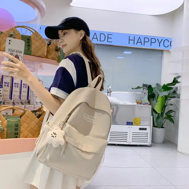 德力熊 美式高级感纯色休闲大容量防水 尼龙 书包背包双肩包 常规 男女同款情侣款 白/黑/蓝/绿/卡其