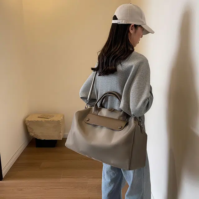 德力熊单肩包尼龙布大号三色可选轻便旅行单肩手提可斜挎背包情侣男女通用