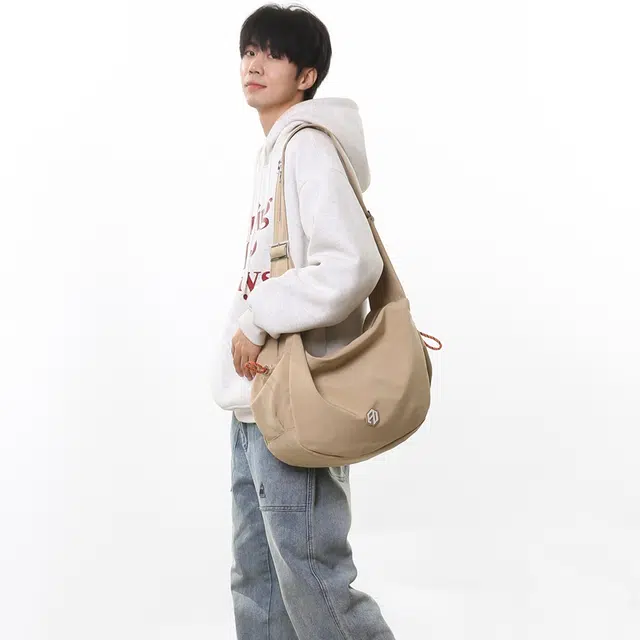 德力熊 韩版多功能百搭出差 尼龙 单肩包 大号小号 男女同款情侣款 黑色橘色卡其色