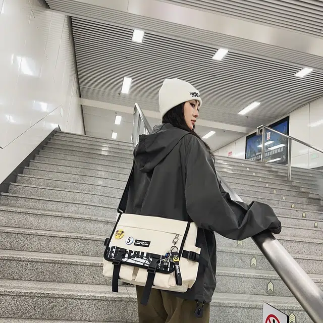 德力熊 潮牌学生休闲日系大容量 尼龙 工装包斜挎单肩包 常规 男女同款情侣款 蓝色/灰色/白色/黑色