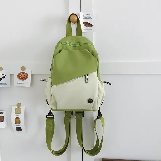 德力熊 时尚百搭撞色双肩包休闲轻便 尼龙 胸包 常规 男女同款情侣款 多色