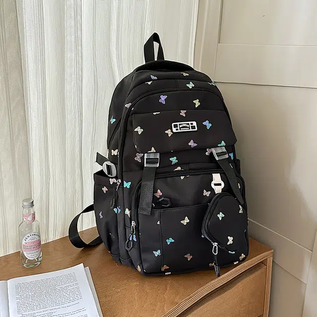 德力熊 日系时尚蝴蝶印花背包简约大容量轻便书包百搭旅行包 尼龙 双肩包 常规 女款 黑色/粉色/咖色/白色/蓝色