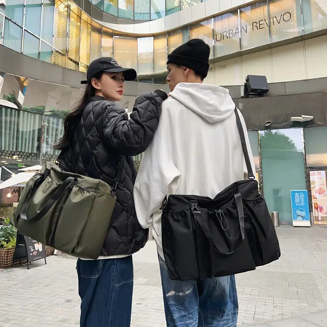 德力熊单肩包潮牌运动大容量休闲潮酷可斜挎可手提 尼龙黑色 军绿色 单肩包情侣男女通用