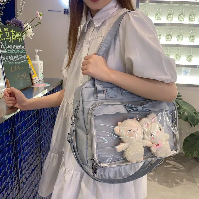 德力熊 日系软妹蝴蝶结 尼龙 斜挎单肩包 常规 女款 粉/蓝/白/黑