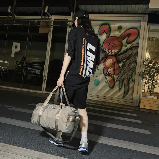 德力熊 多功能休闲简约 尼龙 单肩包 常规 男女同款情侣款 黑色卡其色粉色
