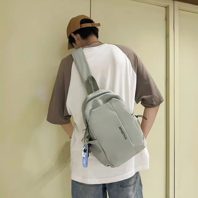 德力熊 防水简约潮酷通勤大容量 尼龙 背包单肩斜挎胸包 常规 男女同款情侣款 绿/白/黑