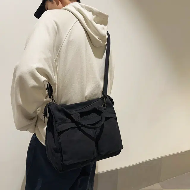 德力熊 大容量日系复古通勤拉链开合 帆布 单肩包 常规 男女同款情侣款 黑/白/绿/棕