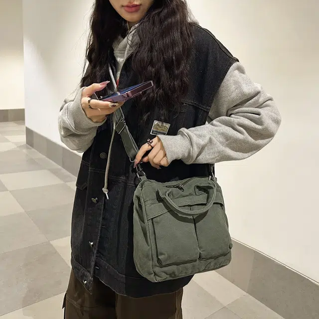 德力熊 大容量日系复古通勤拉链开合 帆布 单肩包 常规 男女同款情侣款 黑/白/绿/棕