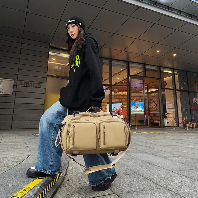 德力熊背包男女通用双色单肩包青年商务多用双肩单肩斜挎手提包休闲大容量短途旅行包牛皮多色尼龙