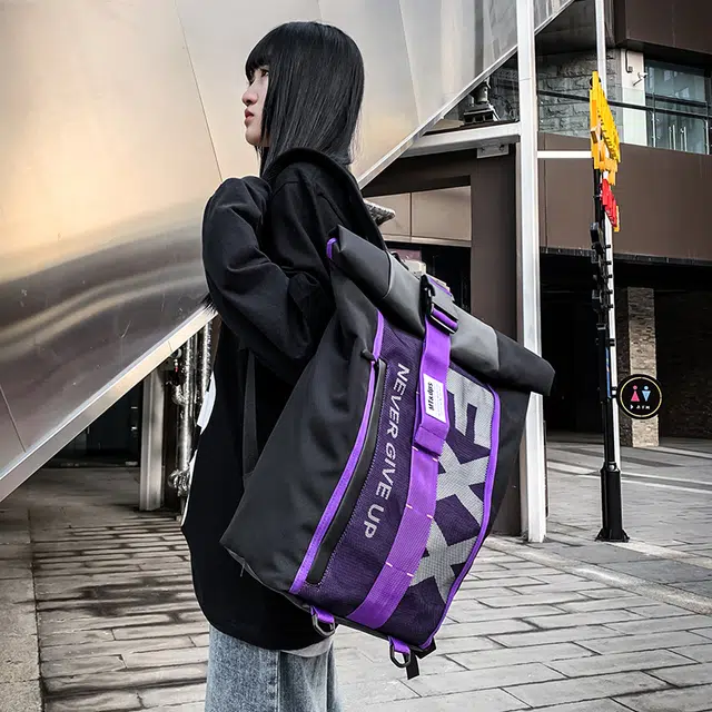 德力熊 潮牌休闲时尚大容量轻便 牛津布 书包背包双肩包 男女同款情侣款 黄色/蓝色/紫色/红色