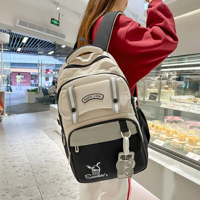 德力熊 撞色百搭书包轻便大容量背包多隔层 尼龙 双肩包 常规 男女同款情侣款 黑色/蓝色/紫色/红色/绿色