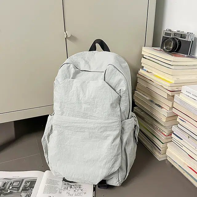 德力熊 纯色简约大容量轻便百搭 尼龙 双肩包 常规 男女同款情侣款 黑色/灰色/棕色/绿色