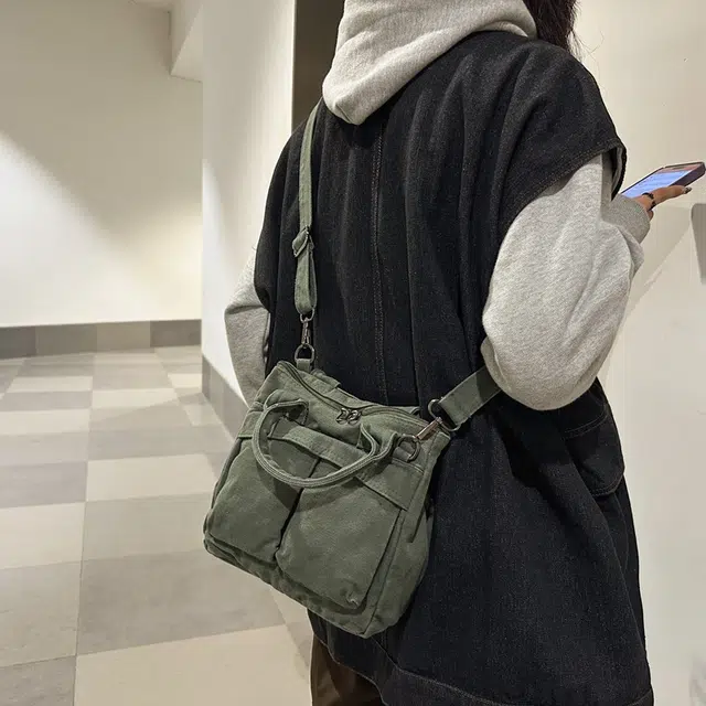 德力熊 大容量日系复古通勤拉链开合 帆布 单肩包 常规 男女同款情侣款 黑/白/绿/棕