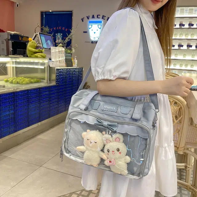 德力熊 日系软妹蝴蝶结 尼龙 斜挎单肩包 常规 女款 粉/蓝/白/黑
