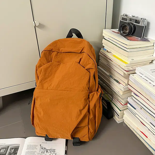 德力熊 纯色简约大容量轻便百搭 尼龙 双肩包 常规 男女同款情侣款 黑色/灰色/棕色/绿色