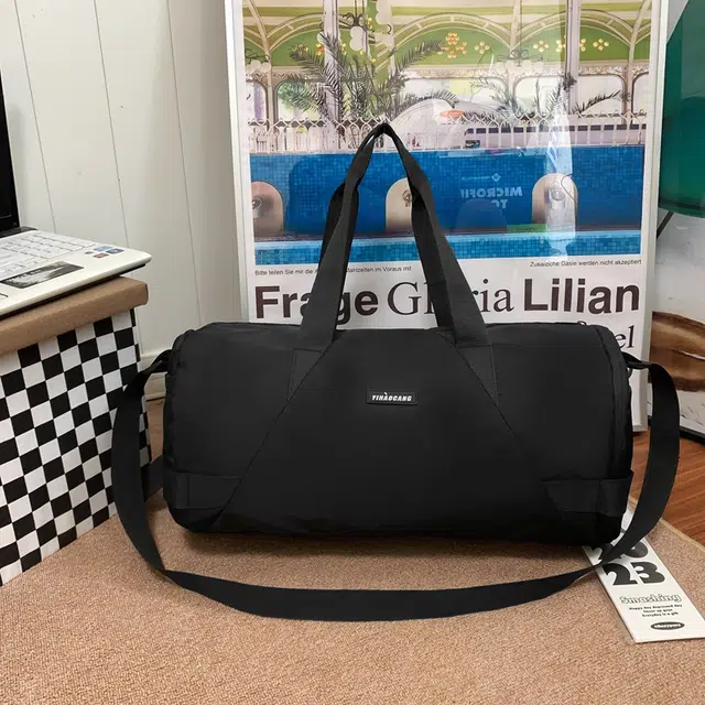 德力熊 潮牌百搭大容量斜挎手提包短途出差行李包 尼龙 旅行包 男女同款情侣款 黑色/白色