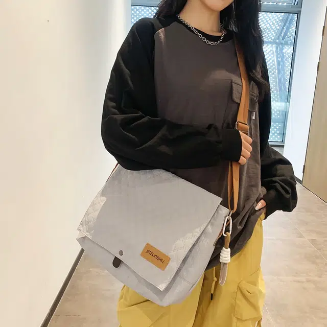 德力熊 尼龙 男女同款情侣款 潮牌新款韩系工装风背包学生休闲单肩包 多色