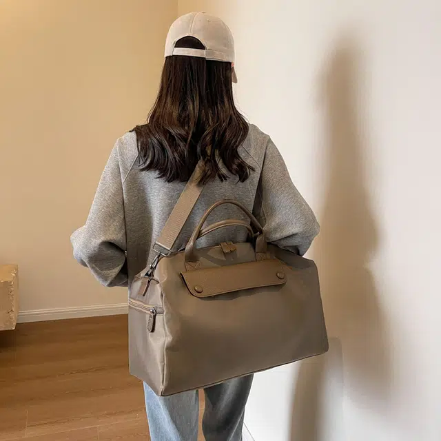 德力熊单肩包尼龙布大号三色可选轻便旅行单肩手提可斜挎背包情侣男女通用