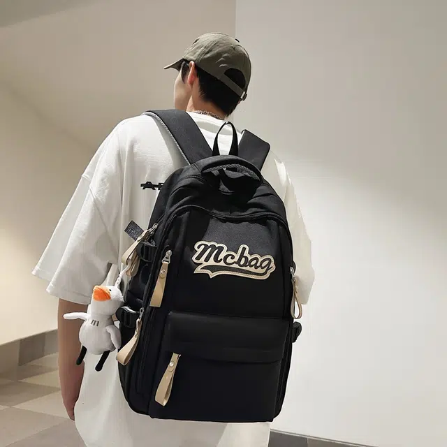 彤彤兔 休闲背包大容量简约轻便 尼龙 双肩包 常规 男女同款情侣款 多色