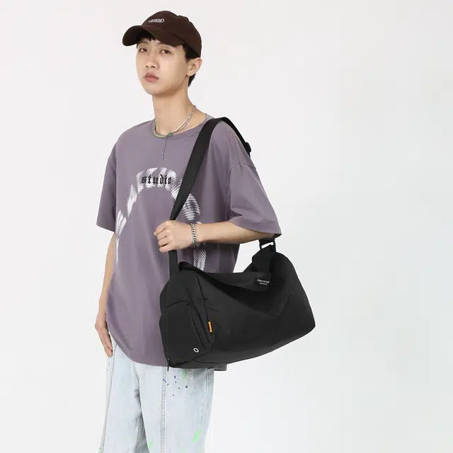 德力熊 简约纯色手提短途旅游斜挎包大容量出差旅游 覆膜牛津布 单肩包 常规 男女同款情侣款 多色